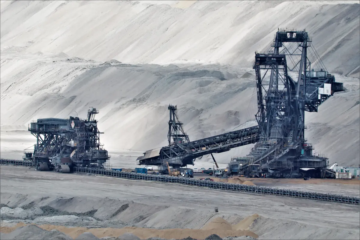 Bucket-wheel excavators and a conveyor at an open-cut mine